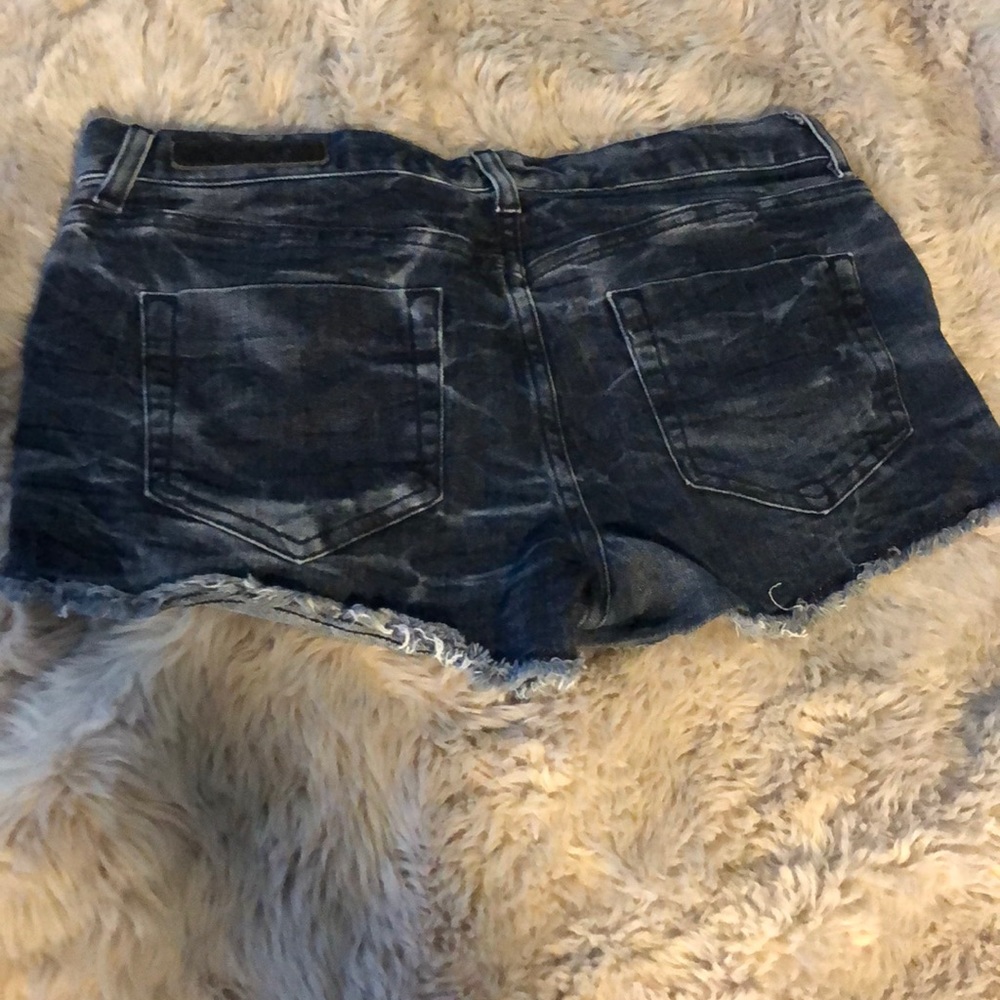 Dark acid wash denim jeans